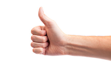 Image showing Male hand showing thumbs up sign isolated on white