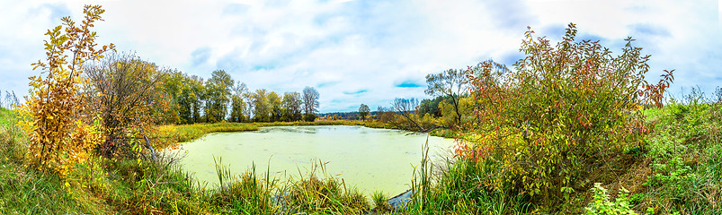 Image showing Forest lake in fall. Panorama