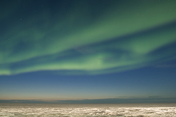 Image showing Aurora strips parallel to twilight horizon