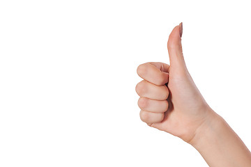 Image showing Female hand showing thumbs up sign isolated on white