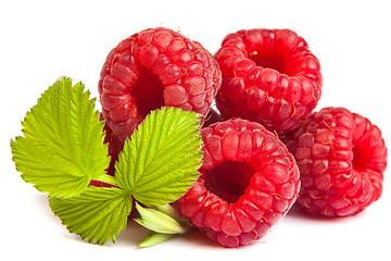 Image showing Bunch of a red raspberry on a white background. Close up macro s