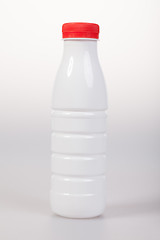 Image showing White Yogurt Plastic Bottle with red cap