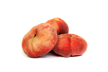 Image showing Three ripe fig peach on white