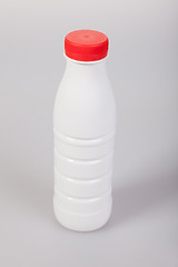 Image showing White Yogurt Plastic Bottle with red cap