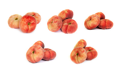 Image showing Set of ripe fig peaches on white
