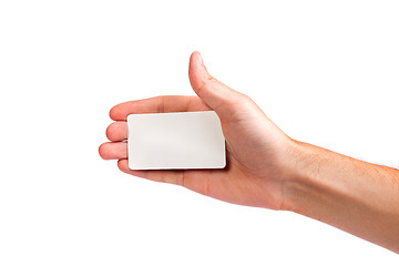 Image showing Businessman's hand holding blank business card