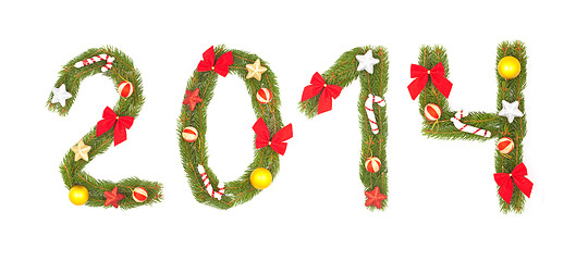 Image showing 2014 number written by christmas tree branches