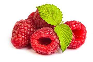 Image showing Bunch of a red raspberry on a white background. Close up macro s