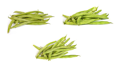 Image showing set of Bunches of fresh green beans on white