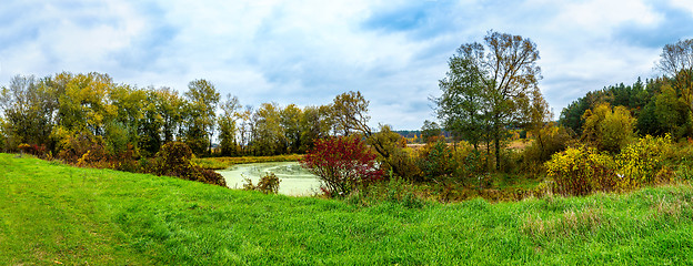 Image showing Forest lake in fall. Panorama