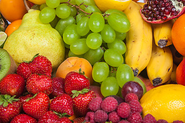 Image showing Huge group of fresh fruits isolated on a white background.