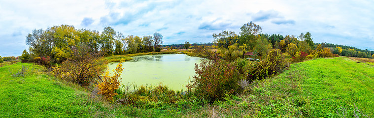 Image showing Forest lake in fall. Panorama