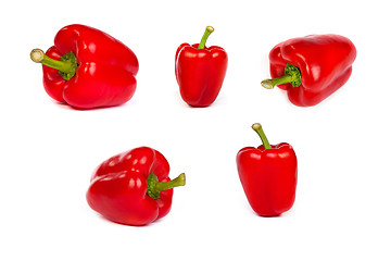 Image showing set of red bell sweet peppers isolated on white