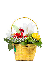 Image showing Beautiful bouquet of bright flowers in basket