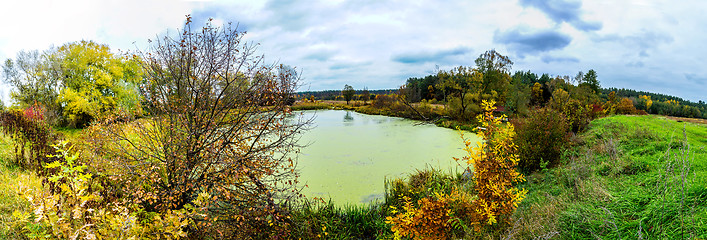 Image showing Forest lake in fall. Panorama