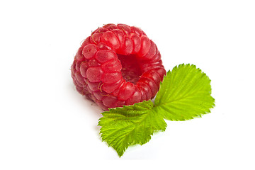 Image showing Bunch of a red raspberry on a white background. Close up macro s