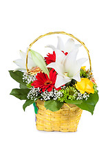 Image showing Beautiful bouquet of bright flowers in basket