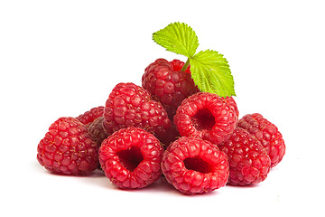 Image showing Bunch of a red raspberry on a white background. Close up macro s