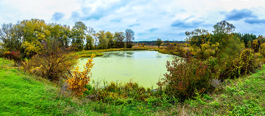 Image showing Forest lake in fall. Panorama