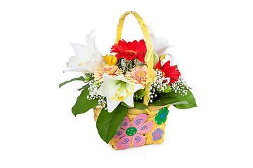 Image showing Beautiful bouquet of bright flowers in basket