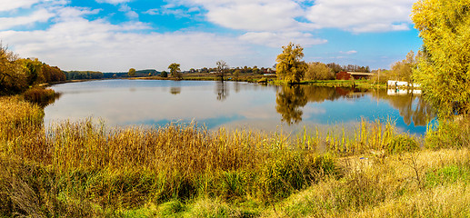 Image showing Forest lake in fall. Panorama