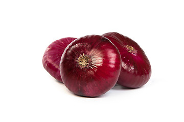 Image showing Group of a red onions, isolated on white