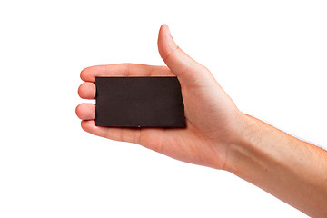 Image showing Businessman's hand holding blank business card