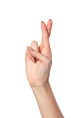 Image showing Crossed fingers symbolizing good luck isolated on white