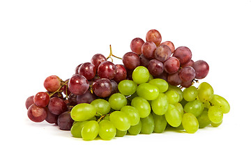 Image showing Bunch of White and Red Grapes laying isolated