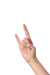 Image showing A woman's hand giving the Rock and Roll sign