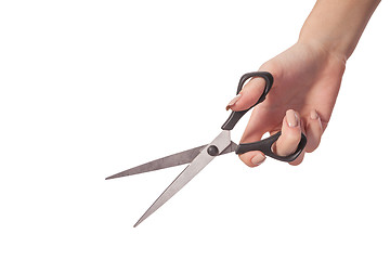 Image showing Hand is holding scissors isolated