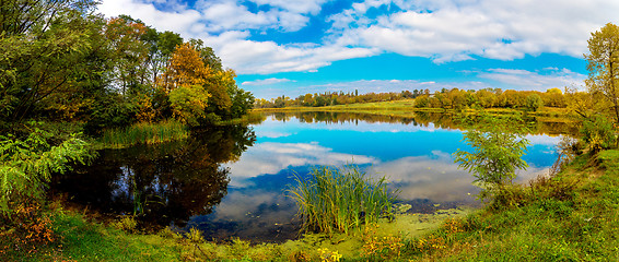 Image showing Forest lake in fall. Panorama