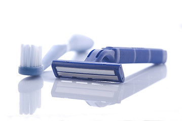 Image showing Razor and toothbrush on white