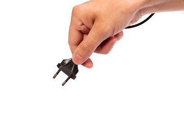 Image showing Man is holding a black outlet in the hand