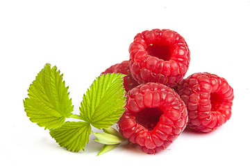 Image showing Bunch of a red raspberry on a white background. Close up macro s