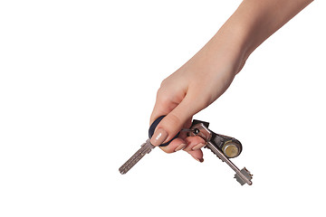 Image showing Female hand holding a key to the house