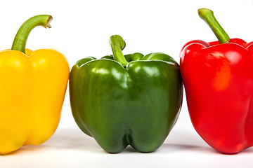 Image showing Group of seet bell peppers isolated on white