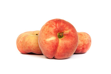 Image showing Three ripe fig peach on white