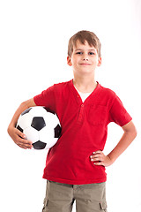 Image showing Cute boy is holding a football ball. Soccer ball