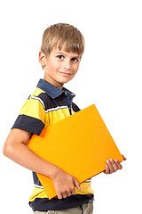 Image showing School boy is holding a book