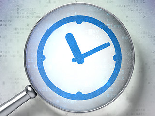 Image showing Time concept:  Clock with optical glass on digital background