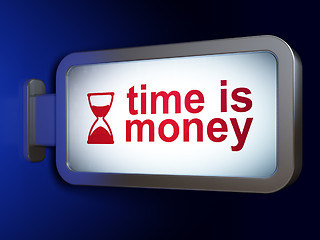 Image showing Time concept: Time is Money and Hourglass on billboard backgroun