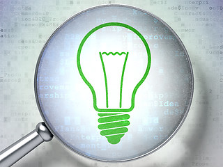 Image showing Finance concept:  Light Bulb with optical glass on digital backg