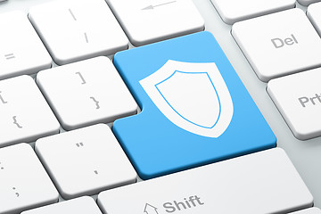 Image showing Privacy concept: Shield on computer keyboard background