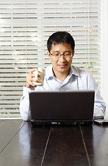 Image showing Working businessman