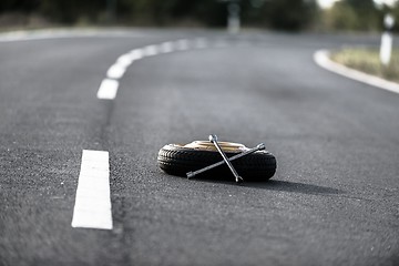 Image showing Emergency tyre on the road