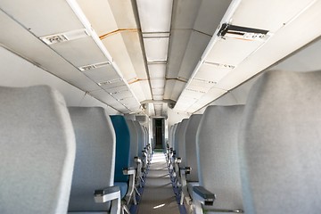 Image showing Interior of an airplane with many seats