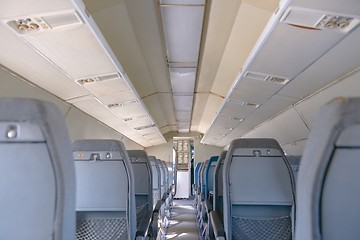 Image showing Interior of an airplane with many seats