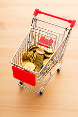 Image showing Golden coin in trolley
