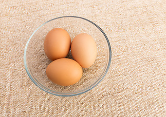 Image showing Brown egg in bowl